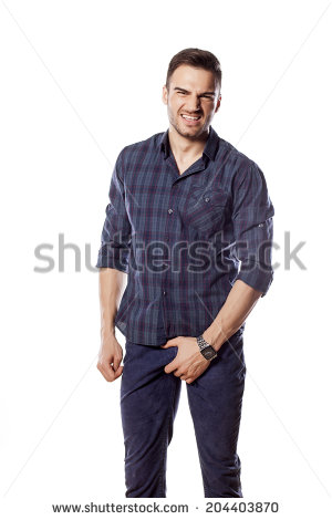 stock-photo-handsome-man-holding-his-penis-through-his-pants-204403870.jpg