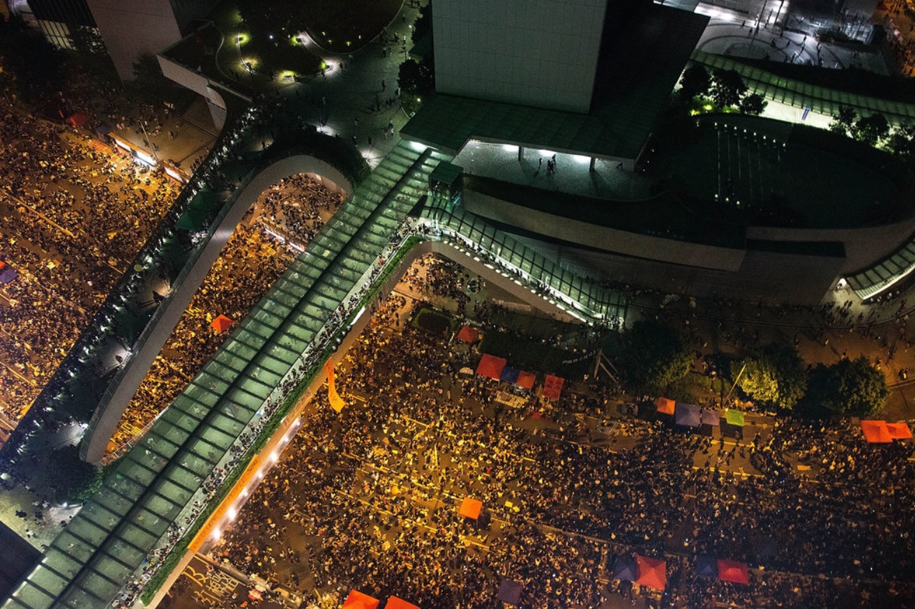 The crowds outside the local government headquarters swelled even larger.jpg