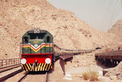 Train_passing_through_Bolan_Pass_Baluchistan_Pakistan_ddrif.jpg