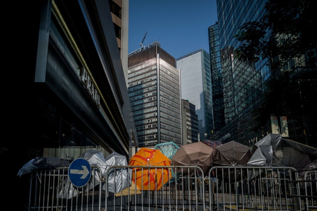 Umbrellas, the symbol of the protest movement, were displayed on a barricade..jpg