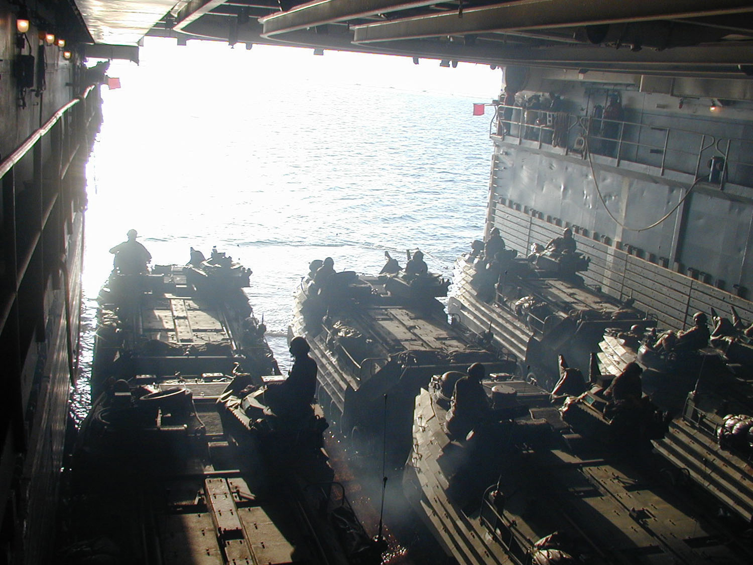 US_Navy_020323-N-9855D-001_USMC_AAV's_prepare_to_leave_the_ships_well_deck.jpg