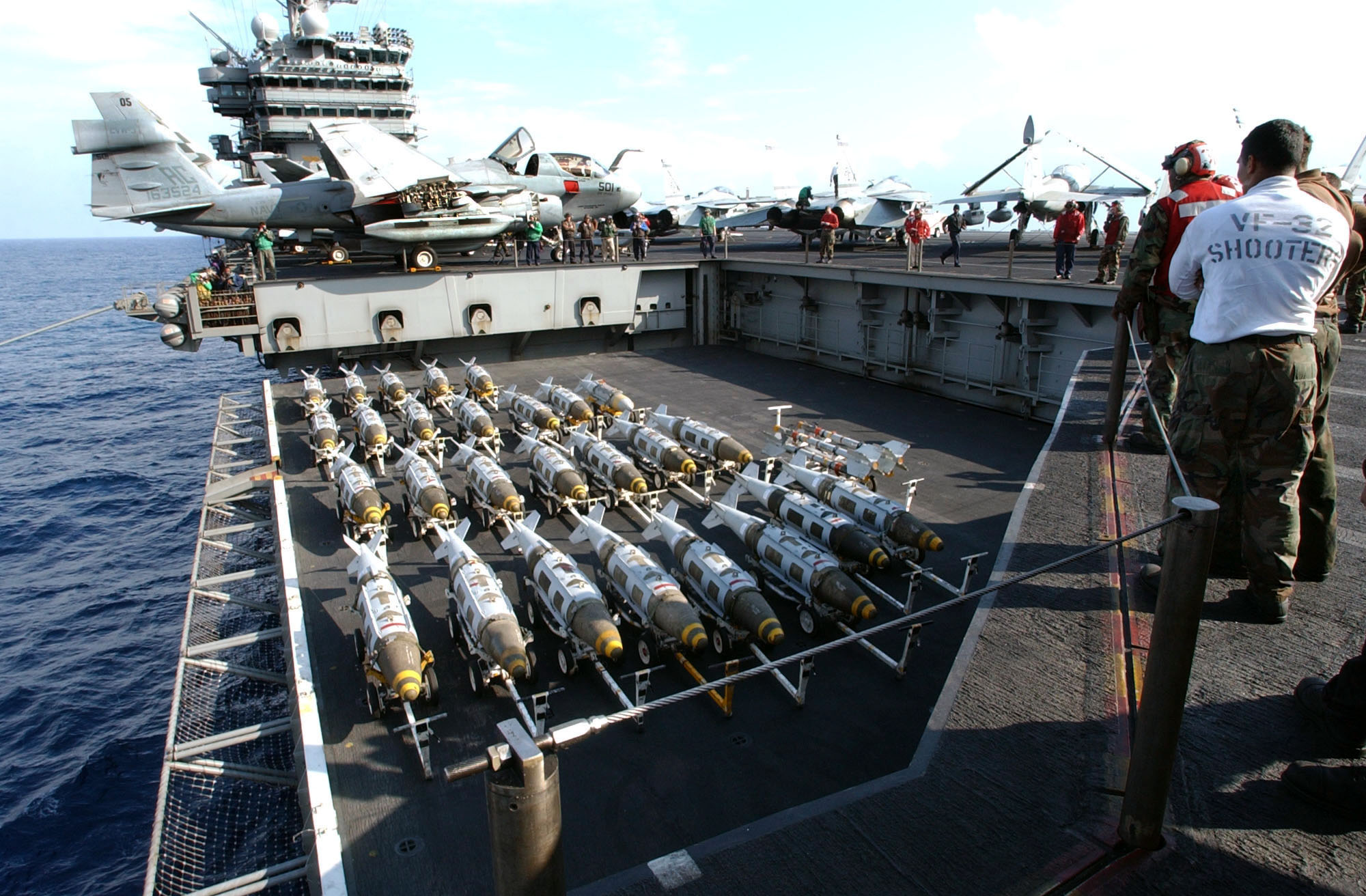 US_Navy_030321-N-31_Joint_Direct_Attack_Munitions_(JDAM)_are_transported_to_the_flight_deck.jpg