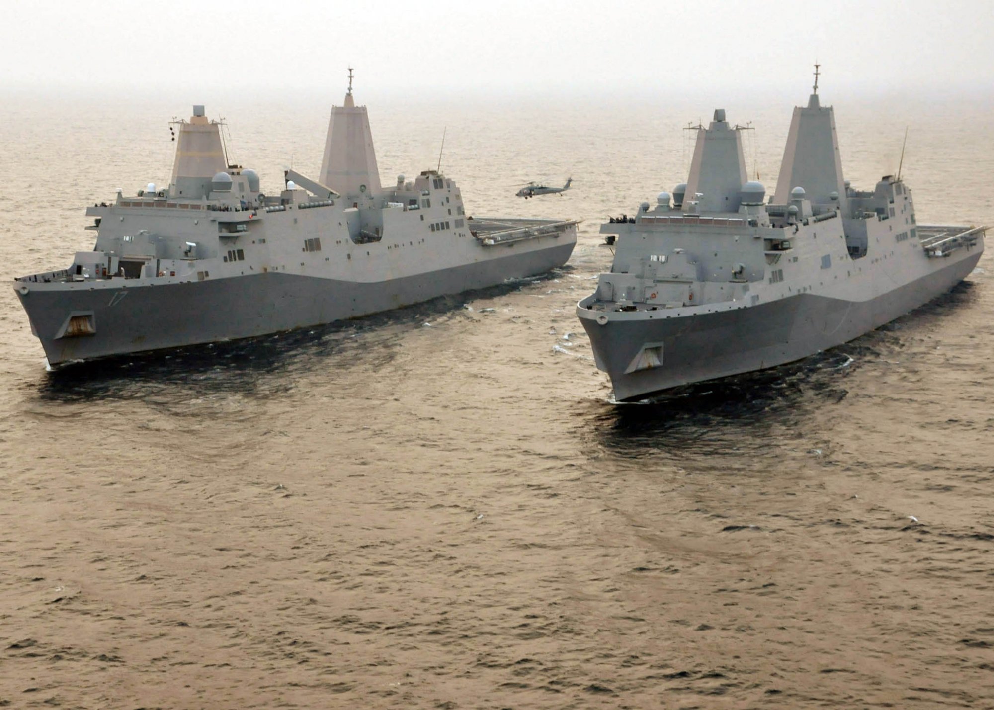 US_Navy_110609-N-VL218-336_The_amphibious_transport_dock_ships_USS_San_Antonio_(LPD_17)_and_US...jpg