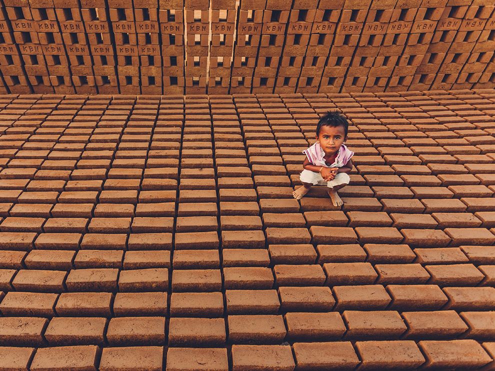 young-girl-india-bricks_90883_990x742.jpg