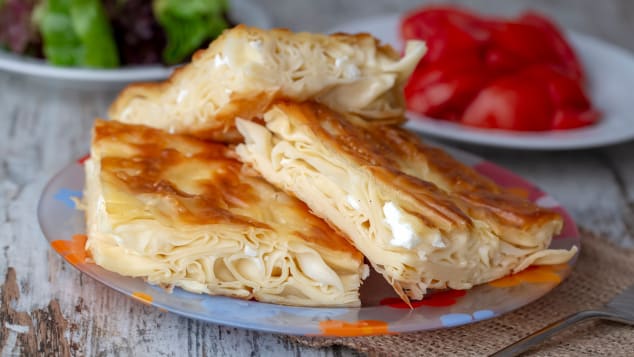 This savory pastry is made by layering sheets of a dough named yufka and adding a filling of white cheese.