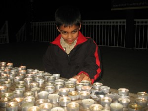 Sikhs-Remembering-Genocide-Lighting-Candles-2-300x225.jpg