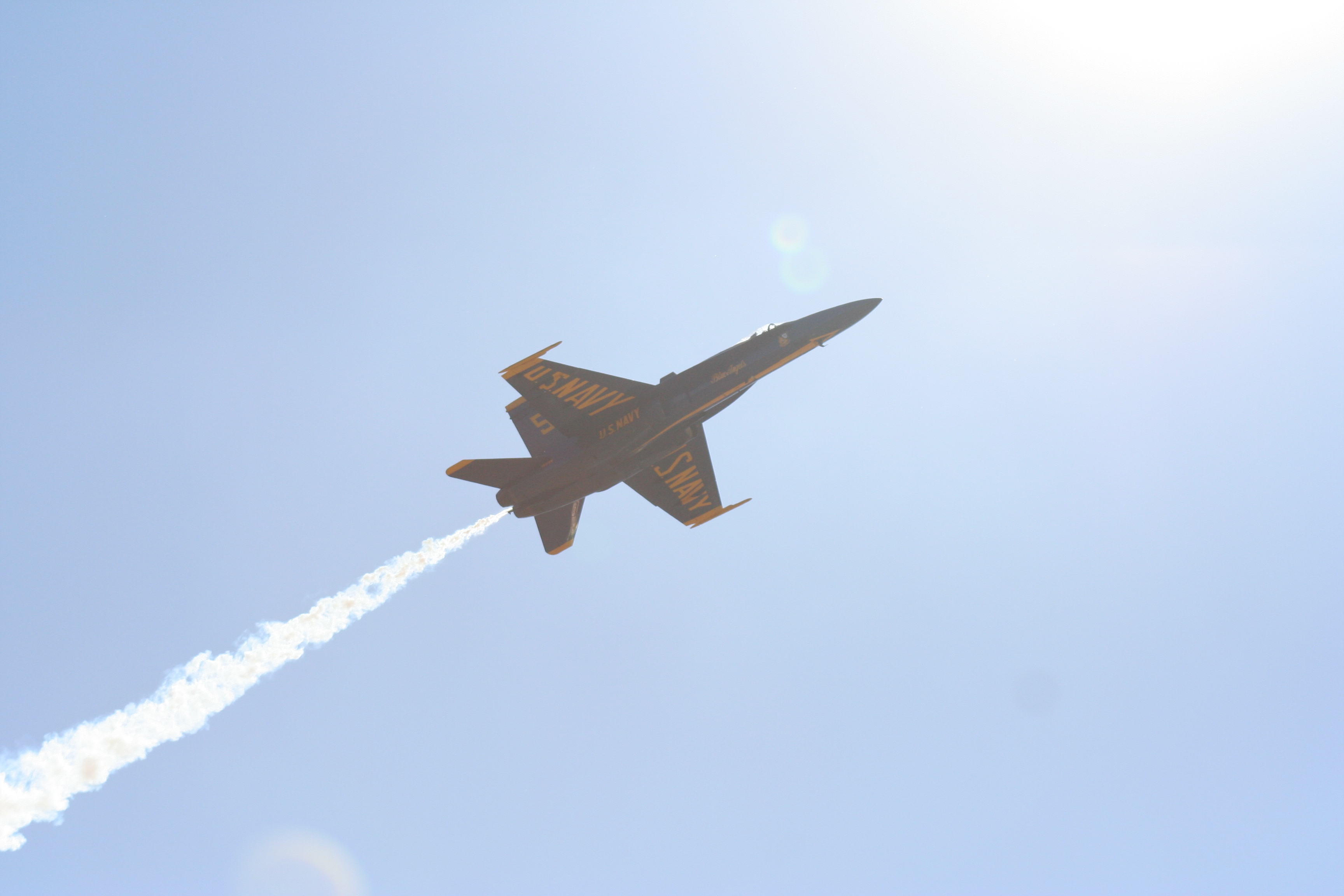 Blue_angels_single_plane_flyover_near_sun.jpg