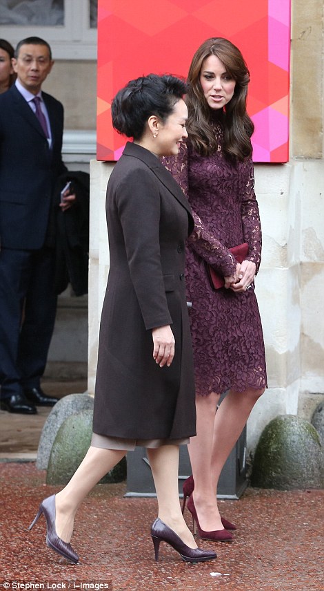 2DA06B2200000578-3283556-The_Duchess_of_Cambridge_chose_a_purple_lace_dress_for_the_visit-a-56_1445463434545.jpg