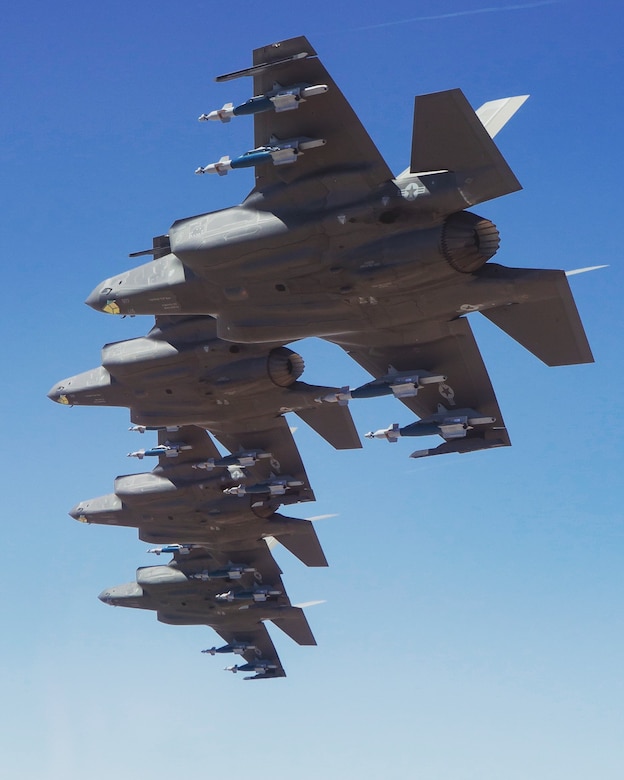Four F-35A Lightning IIs, assigned to the 63rd Fighter Squadron, fly in formation during a training sortie over Arizona, Aug. 9, 2019.
