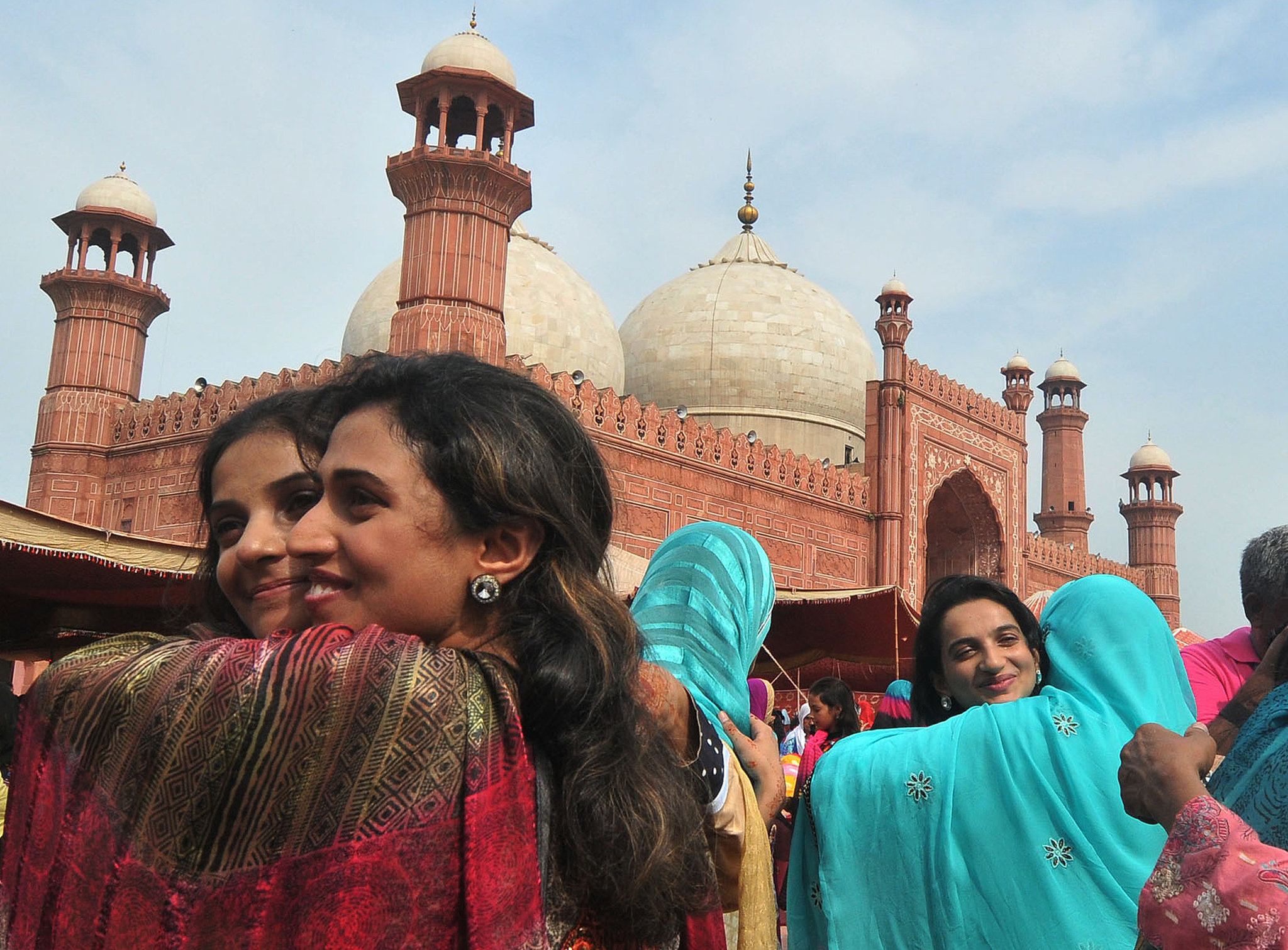 Pakistani-women-greeted-each-other-after-Eid-al-Fitr-celebrations.jpg