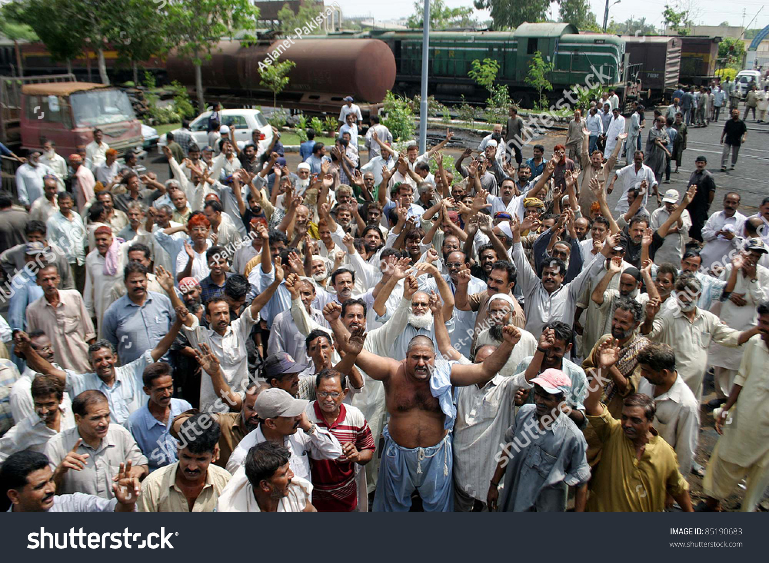 stock-photo-karachi-pakistan-sept-employees-of-railway-are-protesting-against-non-payment-of-their-85190683.jpg