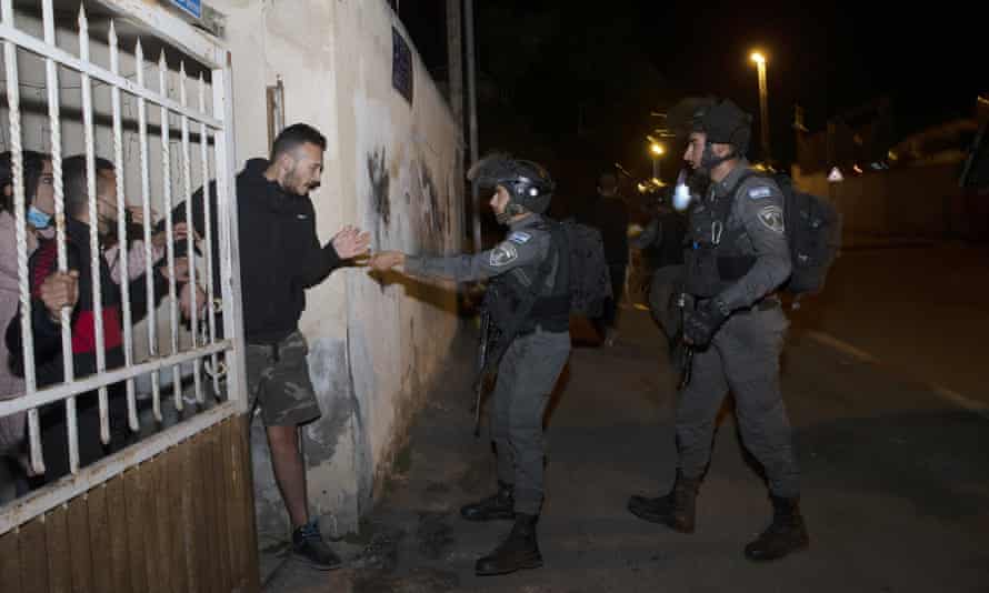 Israeli border police in Sheikh Jarrah, East Jerusalem, on 12 May.