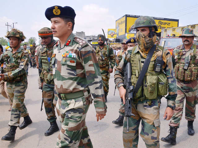 army-personnel-walk-during-an-encounter-with-attackers.jpg