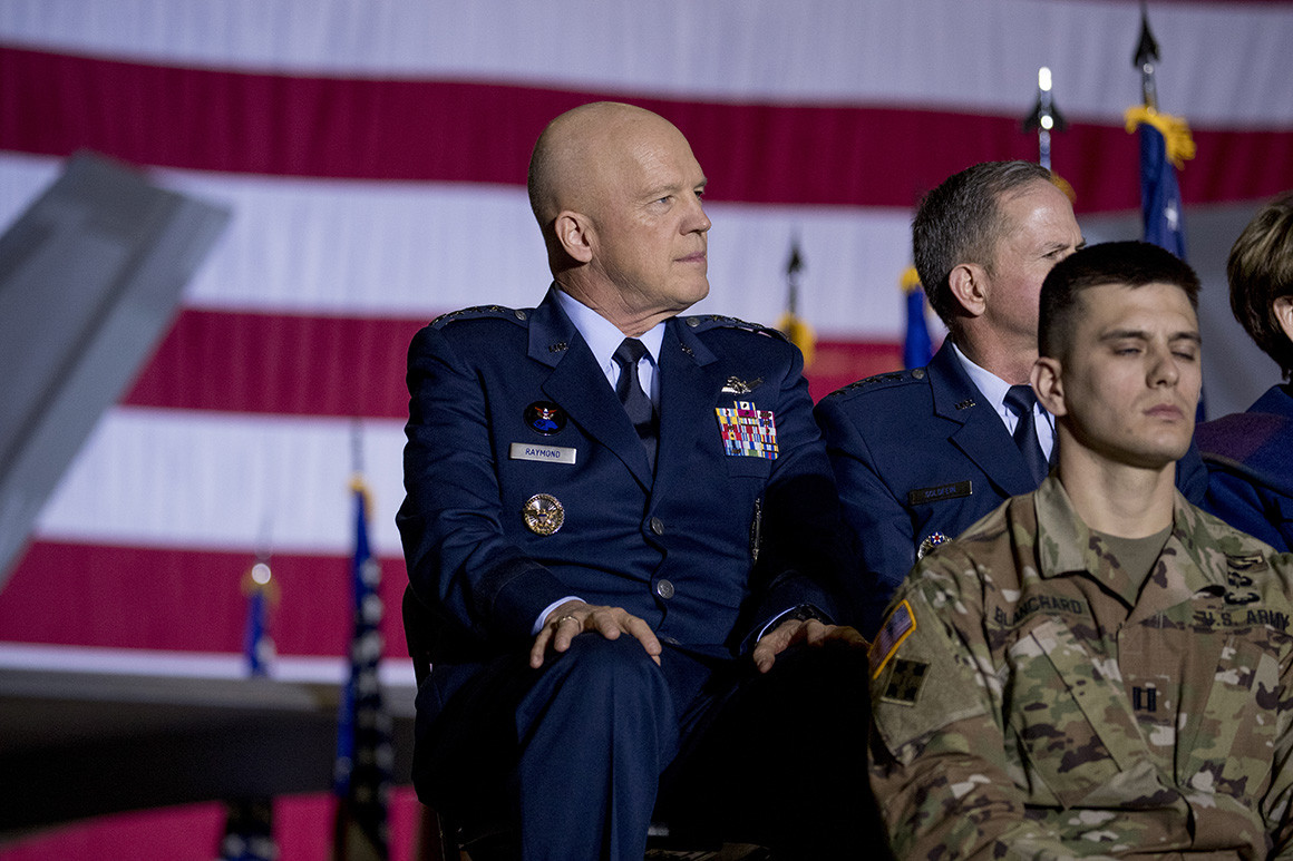 Gen. Jay Raymond sits on stage before President Donald Trump signs the National Defense Authorization Act for Fiscal Year 2020 at Andrews Air Force Base, Md., Friday, Dec. 20, 2019.