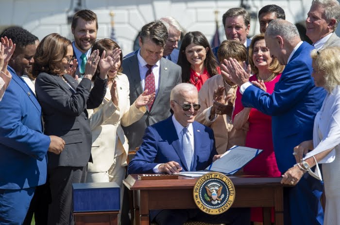 US President Joe Biden signs the CHIPS and Science Act of 2022