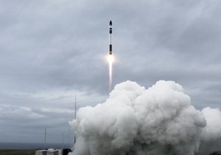 A Rocket Lab Electron rocket launches 10 Earth-imaging satellites for Planet and Canon Electronics into orbit from Launch Complex 1 on the Mahia Peninsula, New Zealand on Oct. 28, 2020.