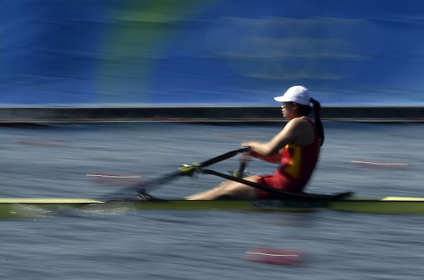 chinas-duan-jingli-rows-during-the-womens-single-sculls-rowing-at-picture-id586407306