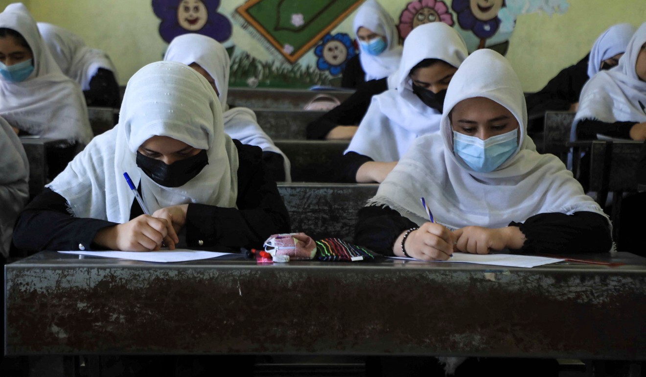 Schoolgirls attend class in Herat, Afghanistan, following the Taliban’s stunning takeover of the country. Photo: AFP