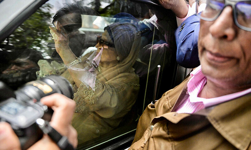 Khaleda Zia (L), Bangladesh’s former prime minister and leader of the Bangladesh National Party (BNP) gestures upon her arrival in Dhaka on May 6. — AFP