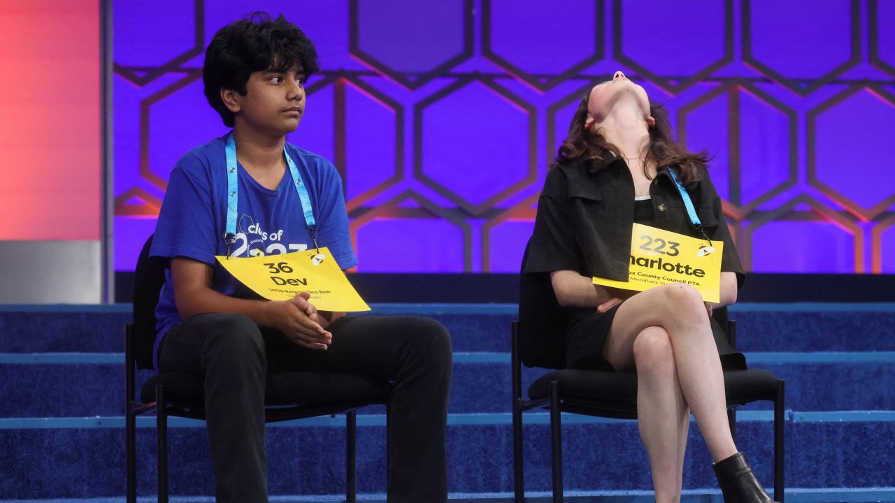 Charlotte Walsh leans her head back after advancing during the finals of the Scripps National Spelling Bee.