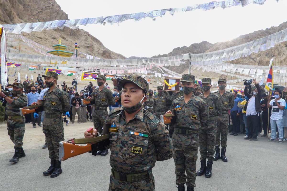 Indian soldiers pay their respects during the funeral of Nyima Tenzin in Leh. Photo: AFP