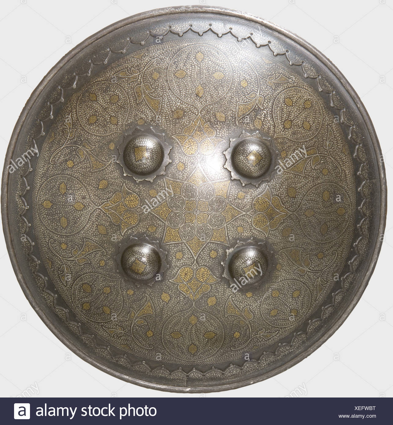 an-indian-shield-lahore-19th-century-a-cambered-shield-with-fine-gold-and-silver-filled-floral-decoration-reinforced-rim-fou-XEFWBT.jpg