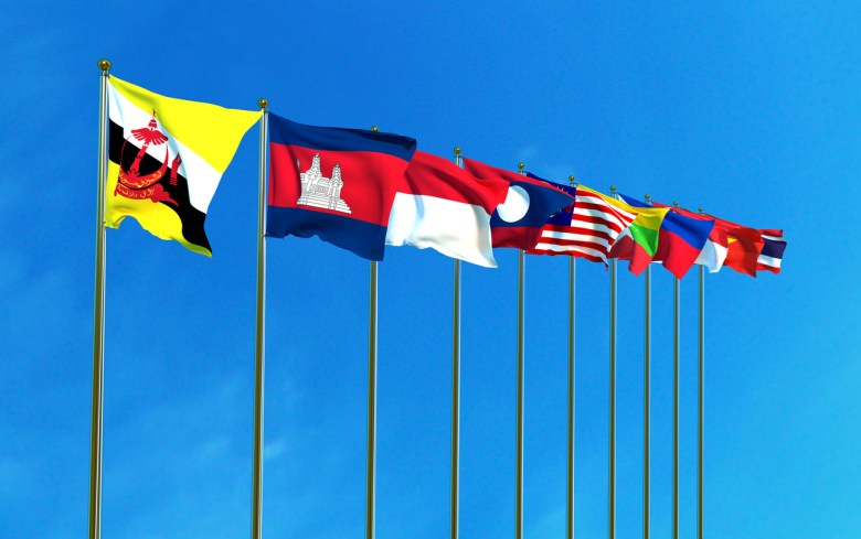 Asean Economic Community flags on the blue sky background. illustration: iStock