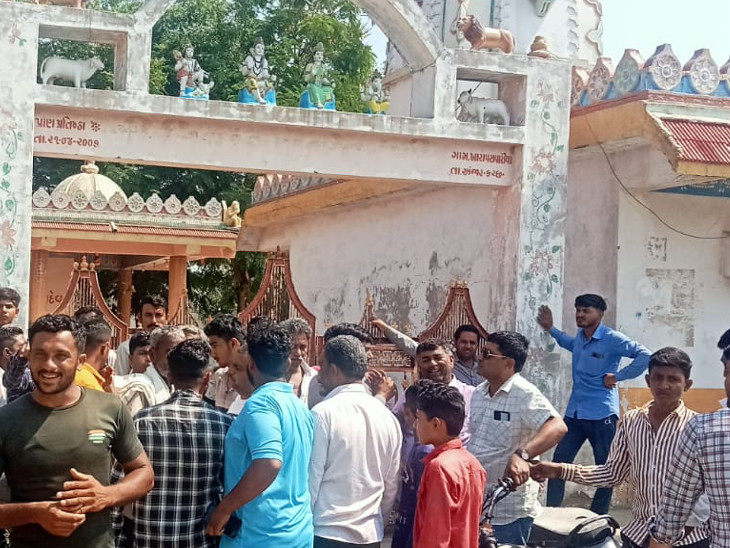 Crowds of people gathered outside the temple following the incident.