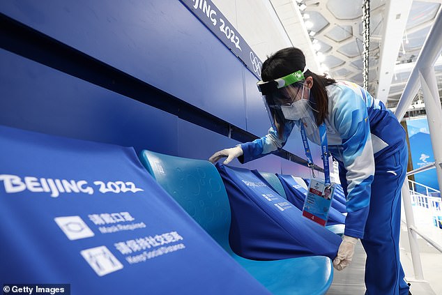 Many Western nations have have announced a diplomatic boycott of the Winter Olympics, citing China's human rights record. Pictured: Staff get National Swimming Centre ready