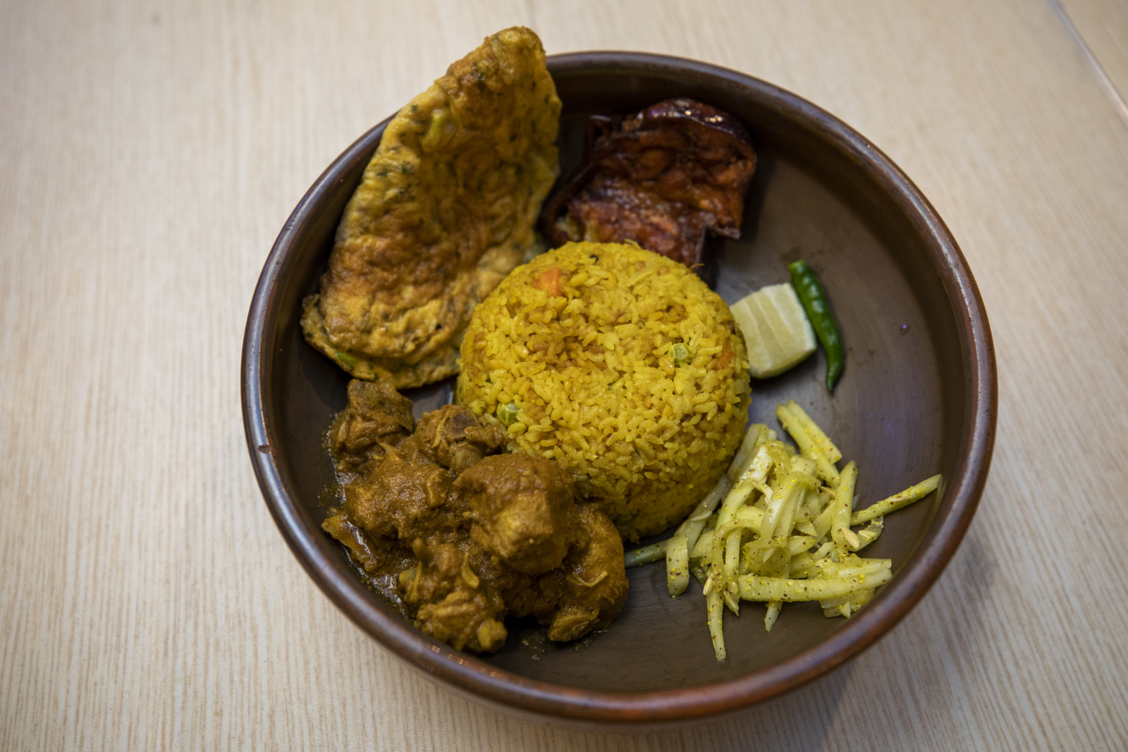 Chicken khichuri from Utshob. Photos: Noor-A-Alam