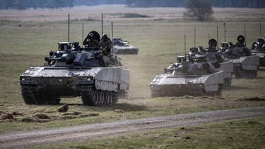 CV90 combat vehicles seen during the Aurora 23 military exercise at Rinkaby firing range outside Kristianstad, Sweden May 06, 2023. (Reuters)