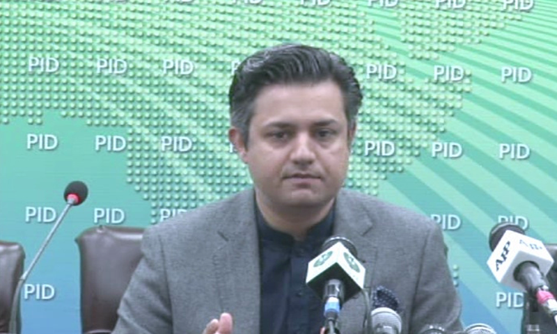 In this file photo, Minister for Industries Hammad Azhar, who has also been given the additional portfolio of finance minister, addresses a press conference in Islamabad. — DawnNewsTV/File