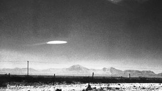 A government employee photographed a UFO that hovered for 15 minutes near Holloman Air Development Center in New Mexico, on Dec.16, 1957.