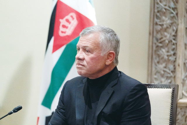 JORDAN’S KING ABDULLAH II listens during a meeting in Amman in May. (photo credit: ALEX BRANDON/POOL VIA REUTERS)