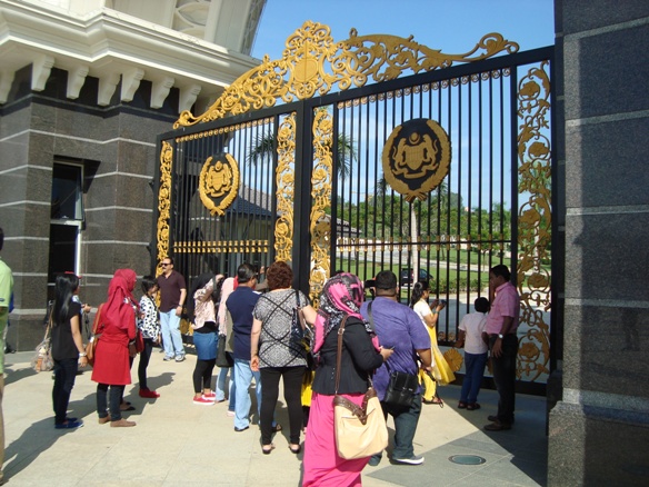 tourists-gathered-outside-the-kings-palace-in-kuala-lumpur.jpg