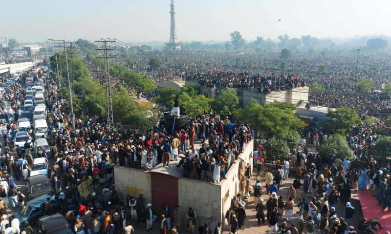 Activists and supporters of TLP gather for the funeral prayer of Khadim Hussain Rizvi in Lahore. — AFP