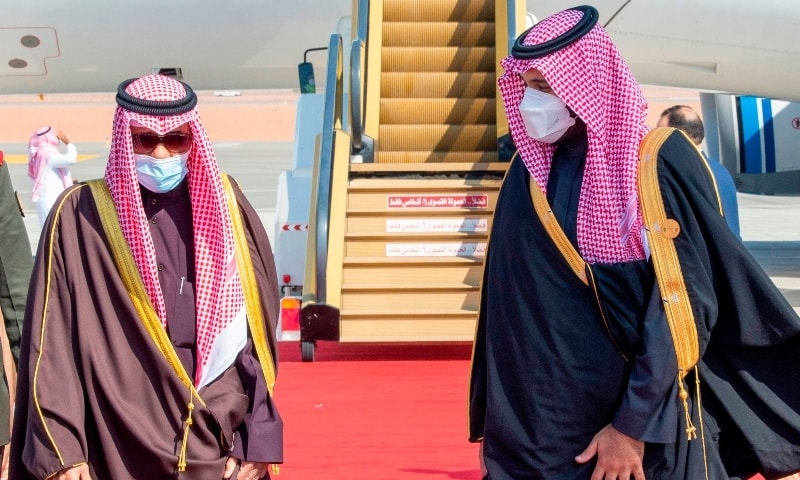 A handout picture provided by the Saudi Royal Palace on January 5 shows Crown Prince Mohammed bin Salman (R) welcoming Emir of Kuwait Nawaf al-Ahmad al-Jaber al-Sabah (L) upon his arrival in the city of al-Ula. — AFP