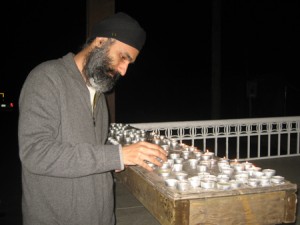 Sikhs-Remembering-Genocide-Lighting-Candles-300x225.jpg