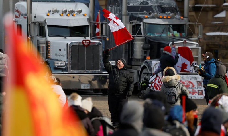 Truckers and supporters continue to protest vaccine mandates in front of Parliament Hill in Ottawa, Ontario. — Reuters