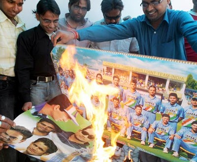 cricket-fans-burn-posters-of-the-indian-cricket-team-as-a-form-of-protest-in-allahabad-on-saturday-ap-photo.jpg