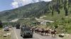 An Indian army convoy moves on the Srinagar-Ladakh highway at Gagangeer, north-east of Srinagar, on June 18, 2020.