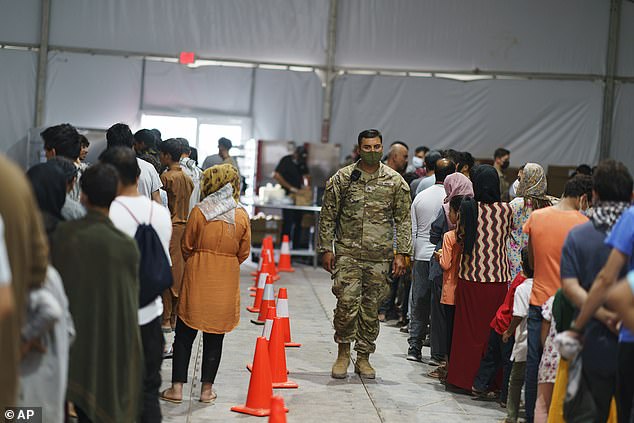 The assault took place at the Army's Dona Ana Complex at the Fort Bliss Base in New Mexico. Pictured, Afghan refugees being processed at the camp on September 10