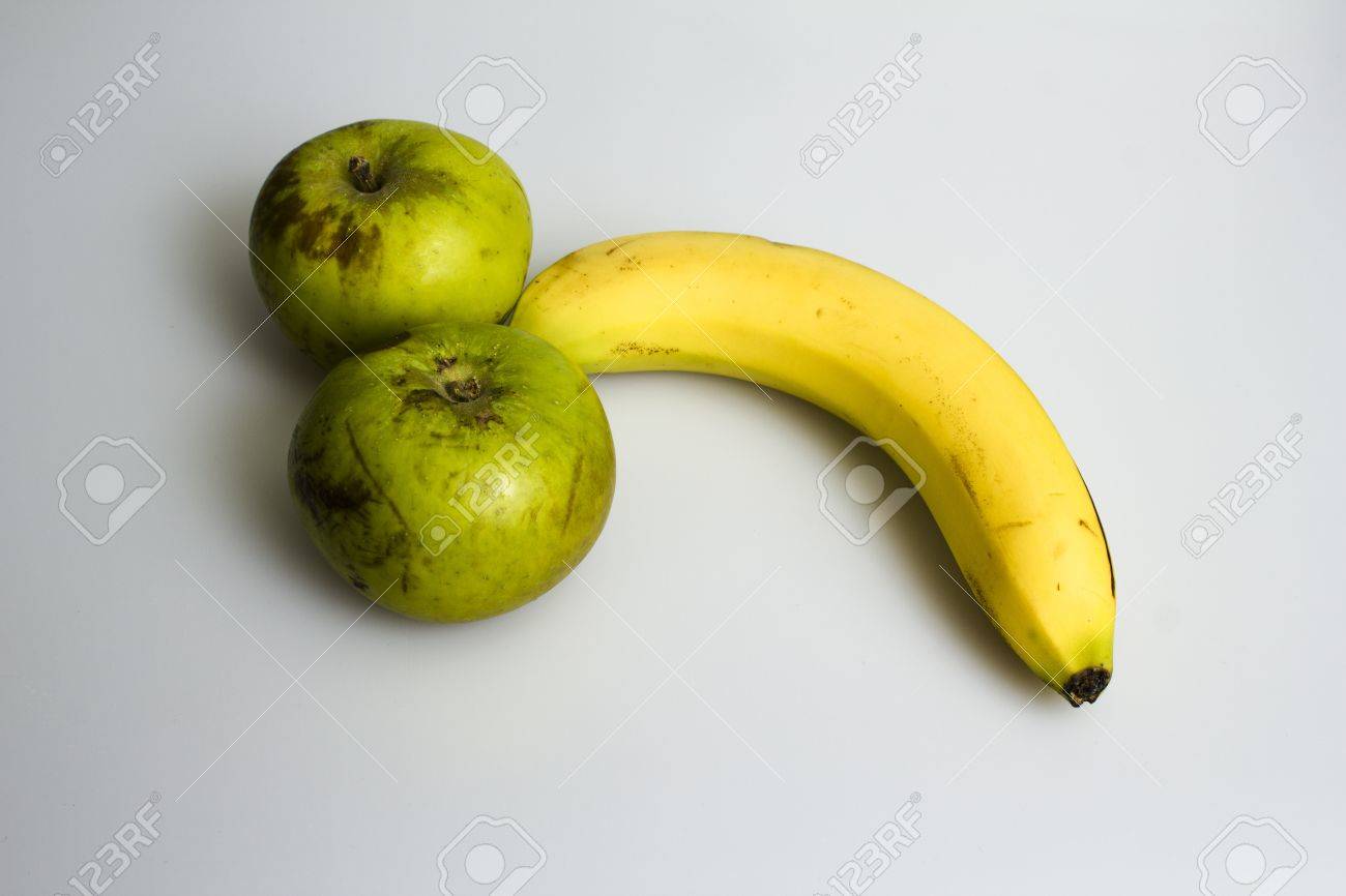 19904297-two-apples-and-a-banana-arranged-in-a-suggestive-manner.jpg