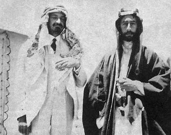 Chaim Weizmann, left, wearing an Arab headdress as a sign of friendship, and Emir Faisal ibn Hussein in 1918.