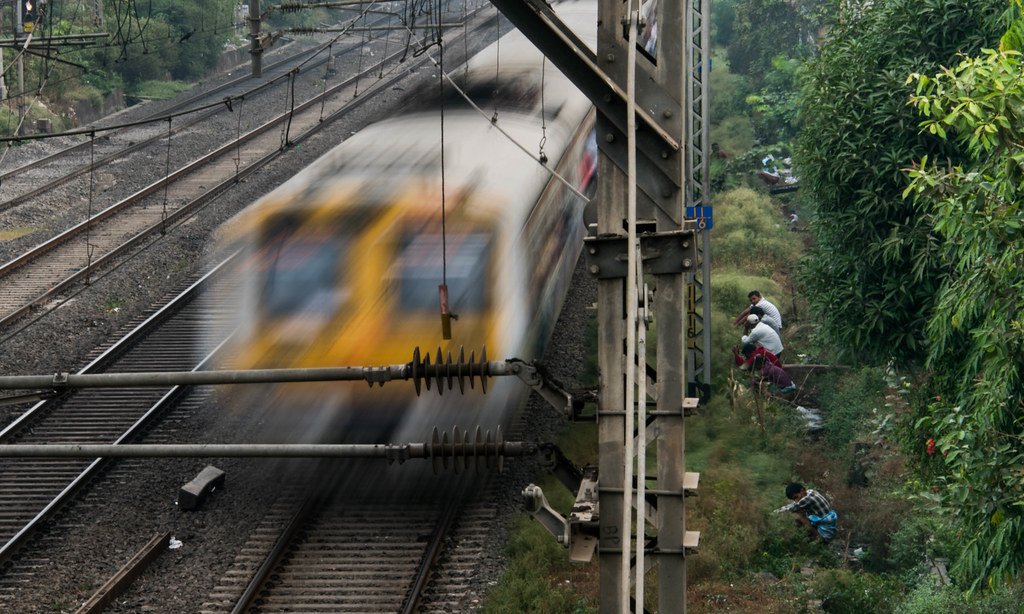 open-defecation-along-mumbais-train-tracks.jpg