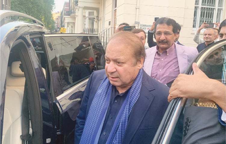 Former prime minister Nawaz Sharif is seen getting into a car in London, where he is currently residing. — Atika Rehman/File