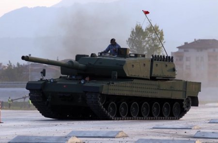 milli-tank-altayin-prototipi-basbakan-erdoganin-katilimiyla-tanitildi-CHA-852491-3-t.jpg