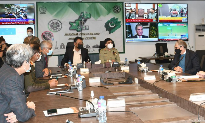 Bill Gates (R) attends a session of the National Command and Operation Centre (NCOC) on Thursday. — Photo via NCOC