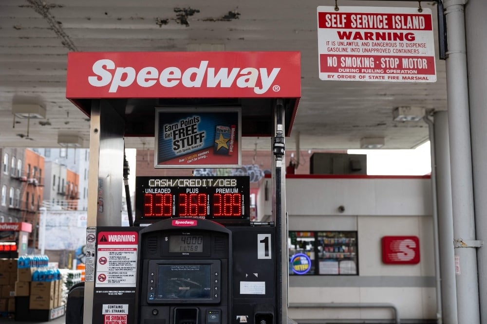 In this file photo, the price of gasoline is displayed at a gas station in New York on December 10, 2021. — AFP