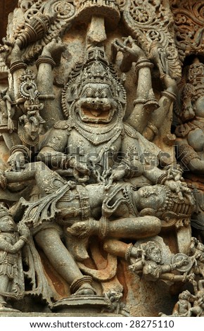 stock-photo-statue-of-narasimha-hoysala-stone-carvings-temple-of-halebid-india-28275110.jpg